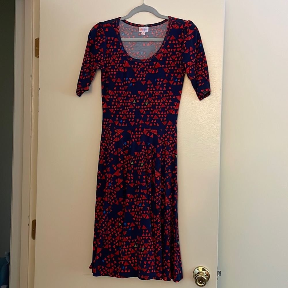 XS LulaRoe dress in blue with red triangle pattern.
